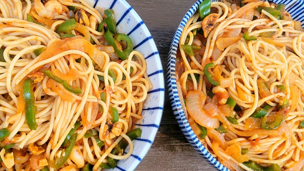 finished spicy seafood past in 2 bowls